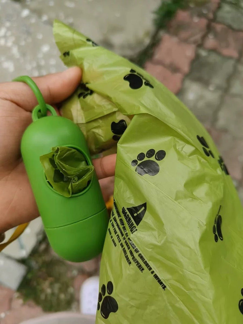 biodegradable trash pet poop bags along with a dispenser designed for convenience and environmental sustainability